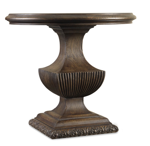 Lower edge of urn table base has acanthus leaf detail