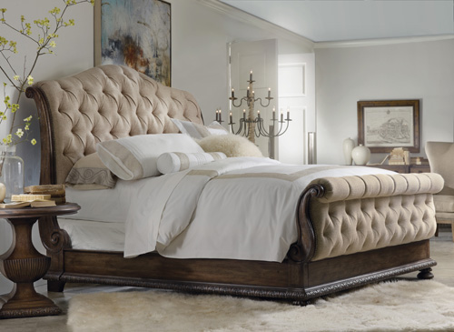 Tufted sleigh bed