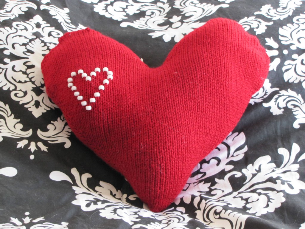 Hand knit beaded heart pillow