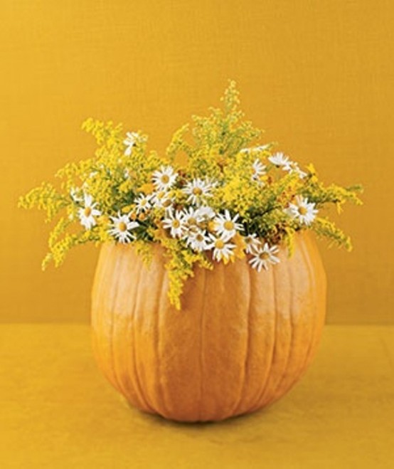 Pumpkins make perfect vases for fall florals