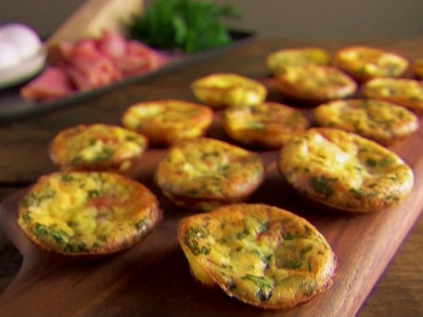 Mini Frittatas would be delicious with a warm scone or muffin.  A quick recipe from Giada De Laurentiis