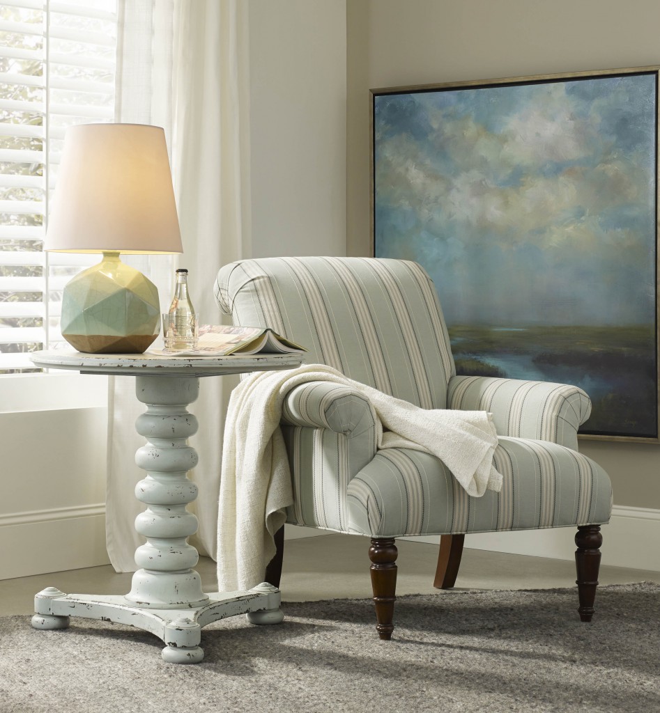 The vintage chairside table in Sunset Point offers a splash of color
