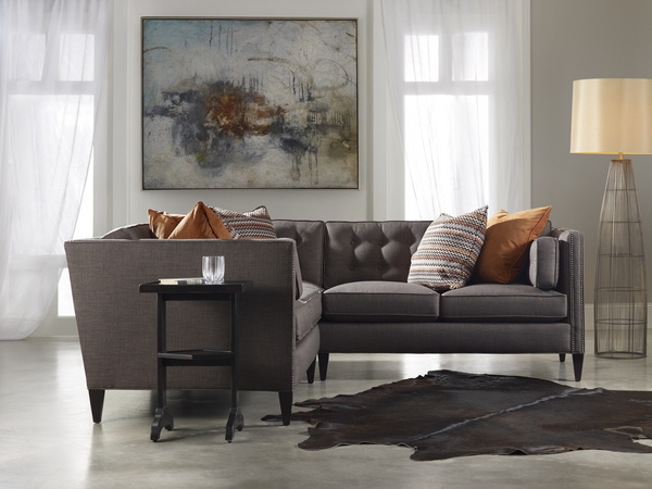 Orange pillows add zest to the Eaton sectional